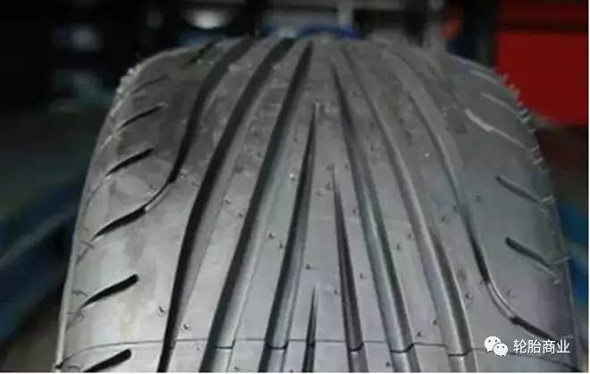 What do HT, AT, and MT in tire types mean?