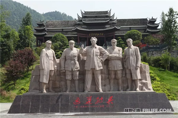 A car with three old men on the Westbound Long March