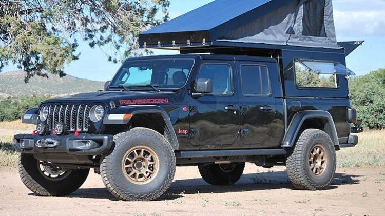 Still reliable pickup truck Jeep Gladiator camping kit release